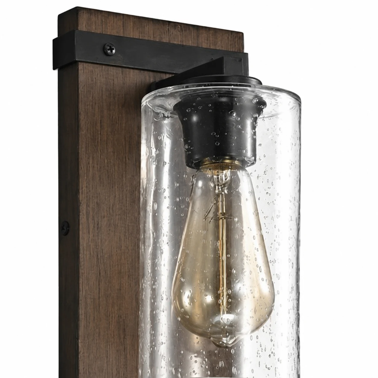 Seeded clear glass wall sconce close-up