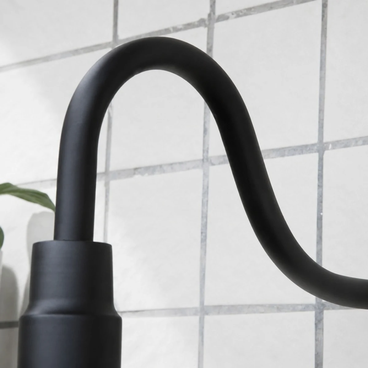 Black curved gooseneck arm and socket detail