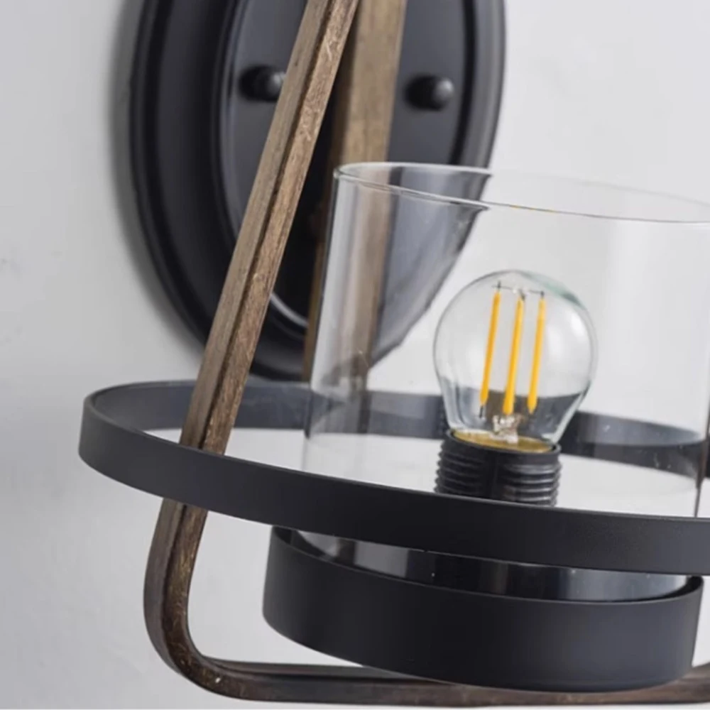 Clear glass shade and black lower ring detail