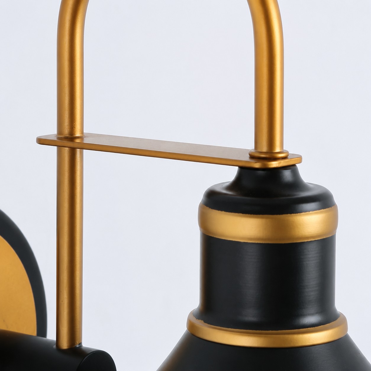 Gold arched arm and socket detail