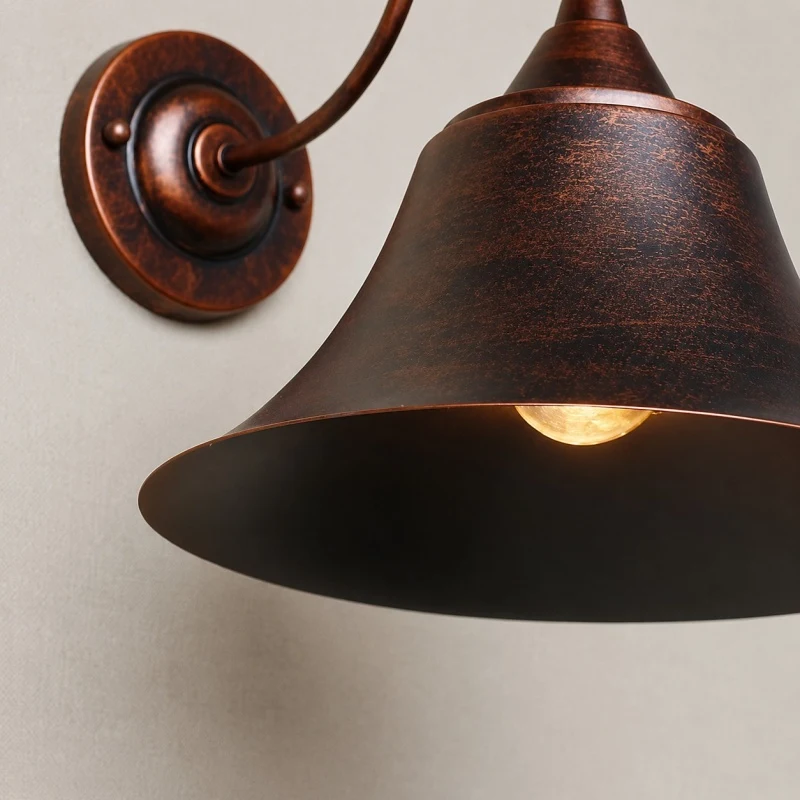 Close view of the Rust finish and round wall canopy