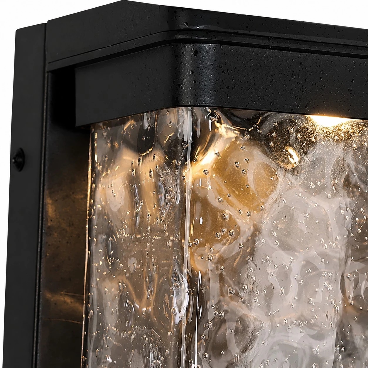 Close-up of clear textured shade on outdoor LED wall light