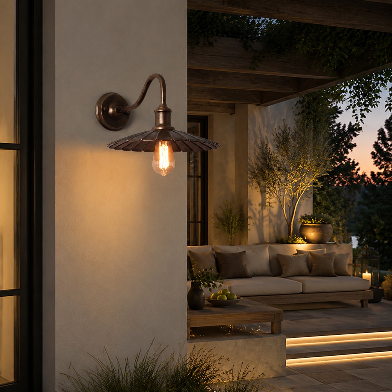Antique Bronze wall sconce at a covered patio