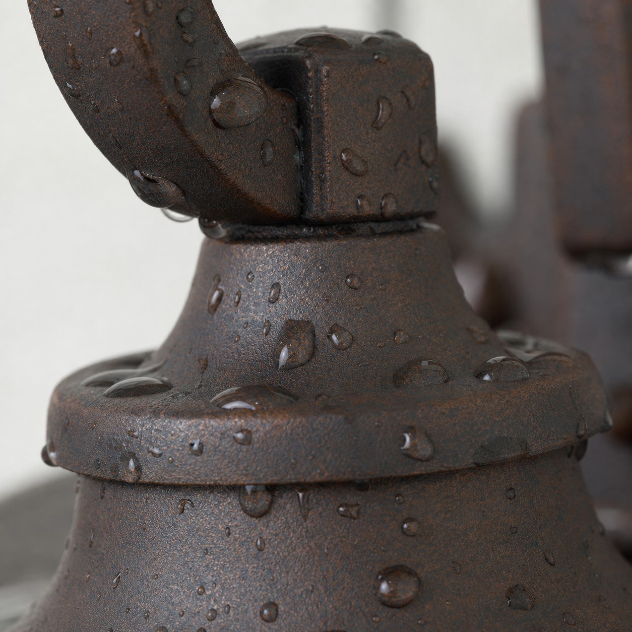 Rain drops on the metal top and curved support