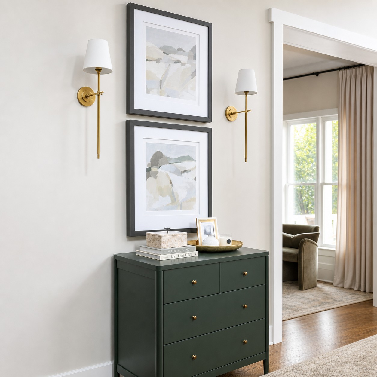 Pair of Bryant brass wall lamps in a refined hallway