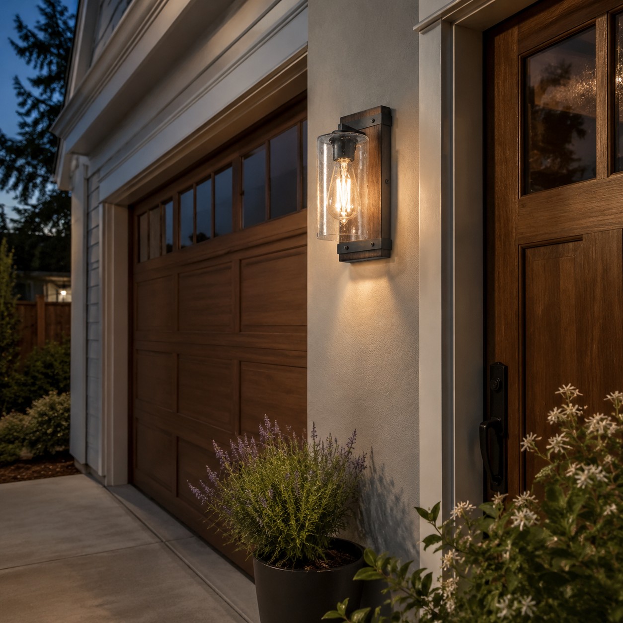 Seeded glass wall sconce beside a garage entry