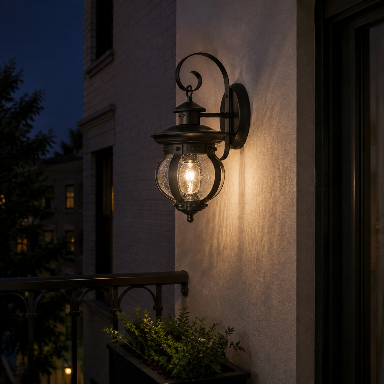 Black outdoor wall lantern illuminating a garage-side entrance