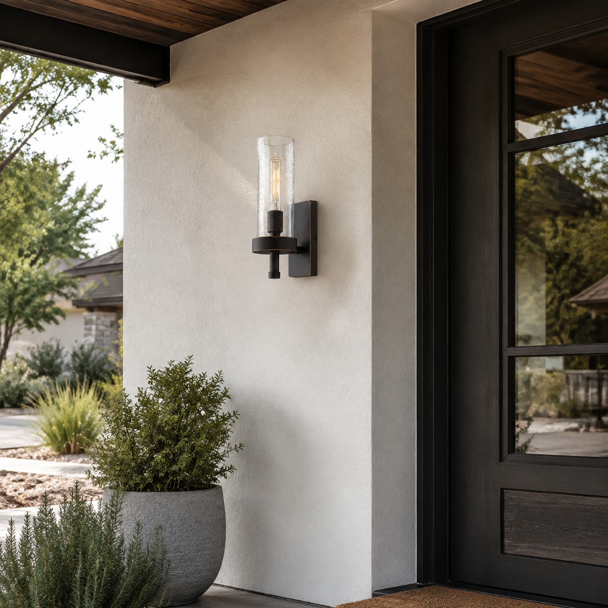 Wall sconce at a covered entry