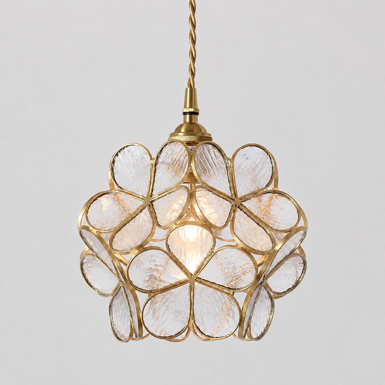 Transparent flower-glass pendant on a white background