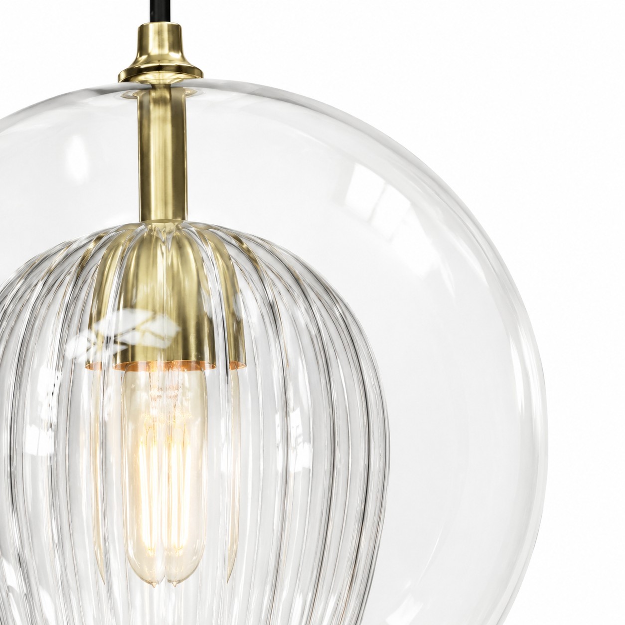 Close-up of the clear outer globe around a ribbed inner glass shade