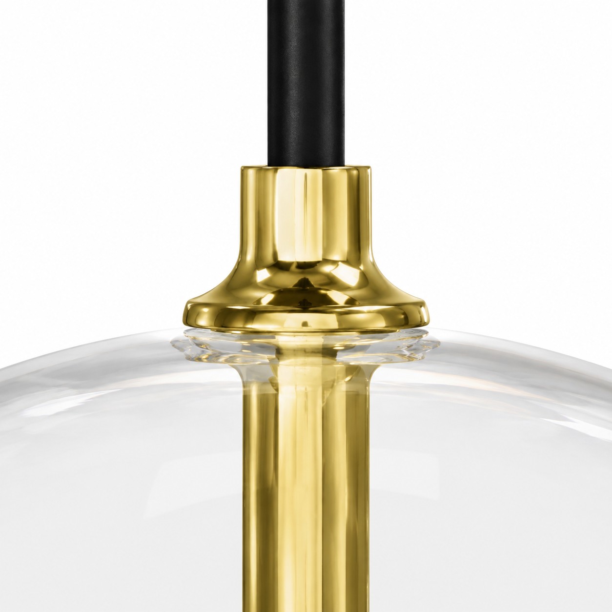 Close-up of the brass-toned cap where the black cord meets the glass globe