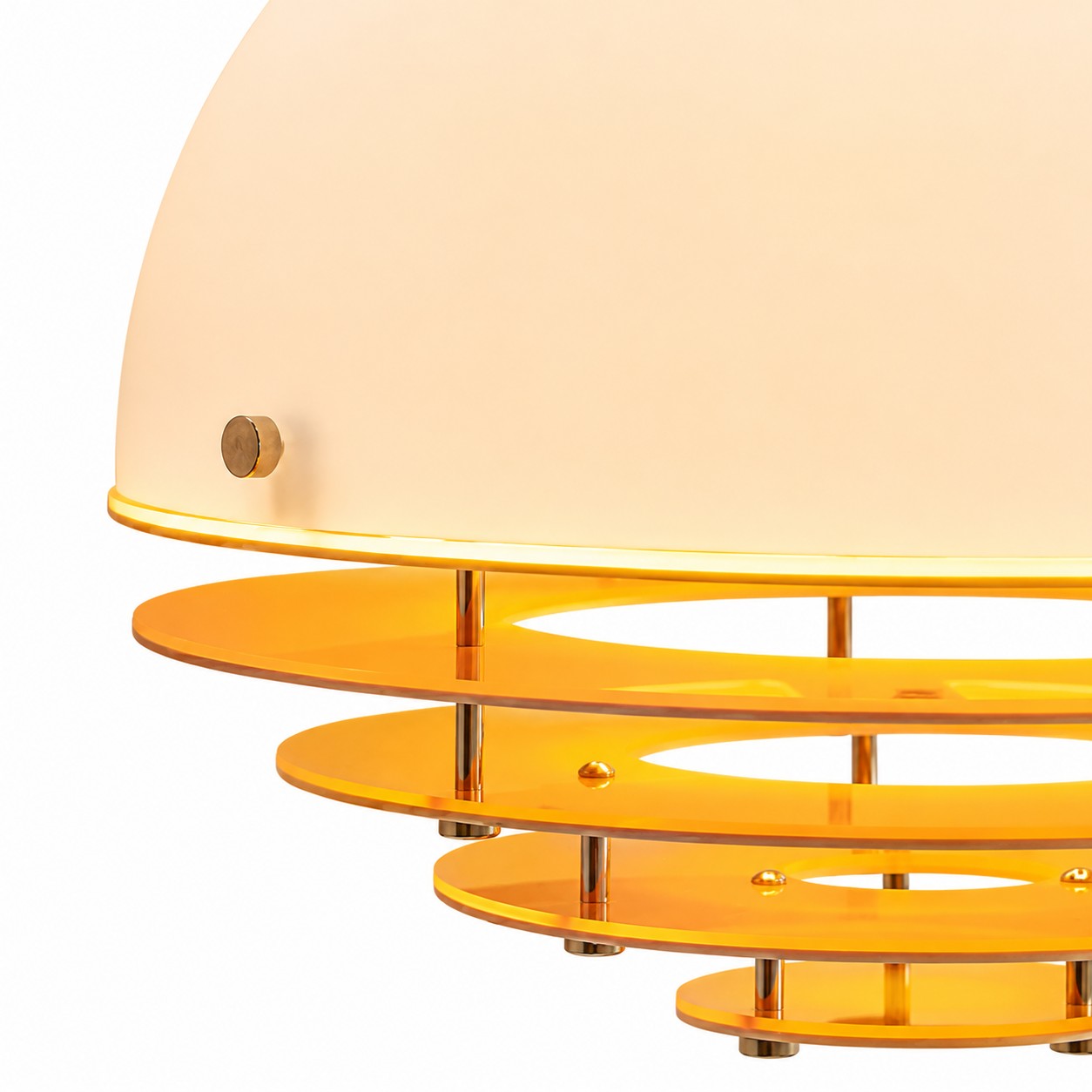 Close-up of translucent orange discs with white rims and chrome posts