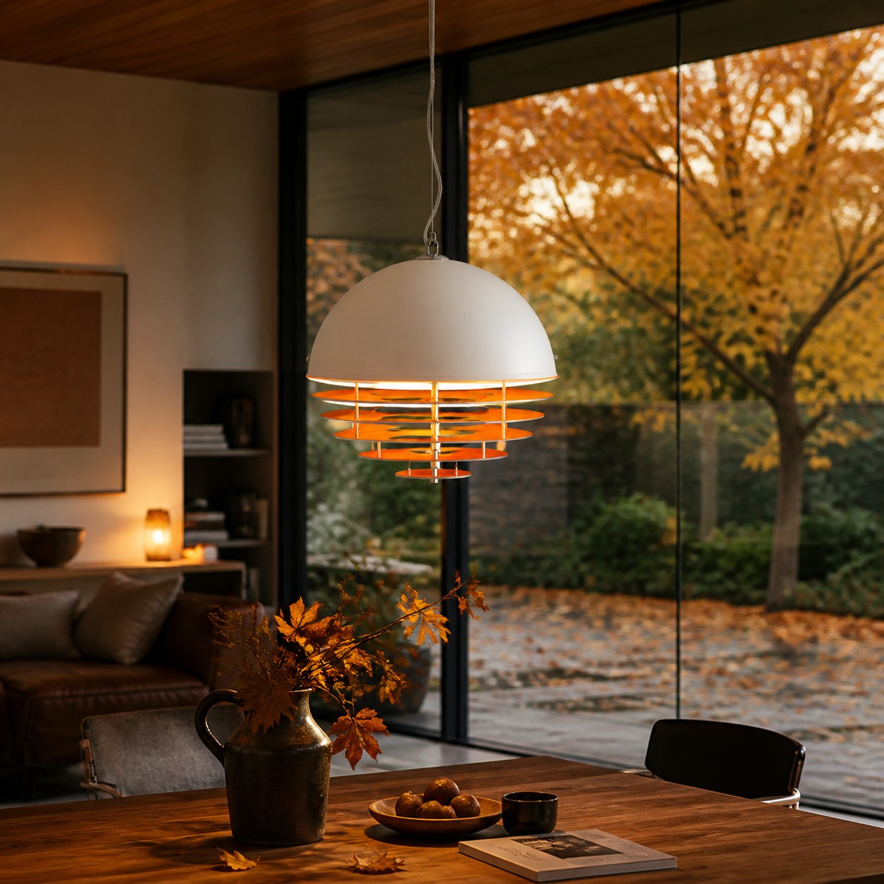 Sunset pendant hanging over a wood dining table