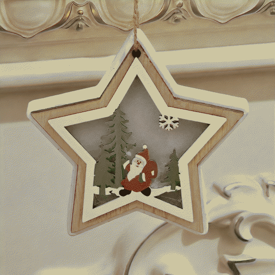 Animated wooden star hanging ornament with Santa and trees and warm interior light