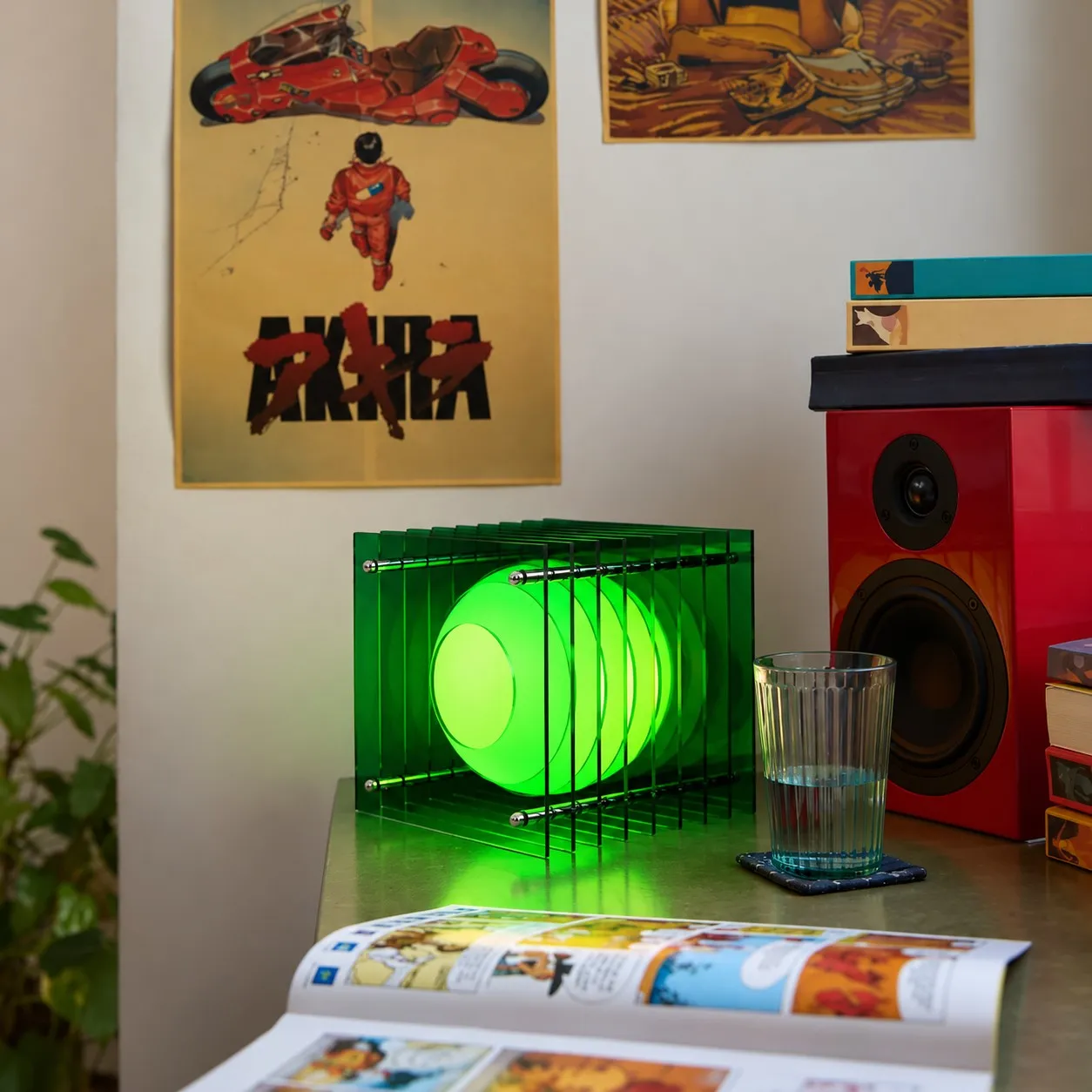 Green acrylic cube lamp on a desk